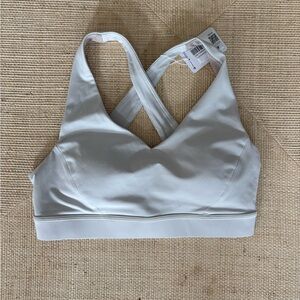 New with tags Lululemon light blue Envital Cross-Back Sports Bra sz B/C